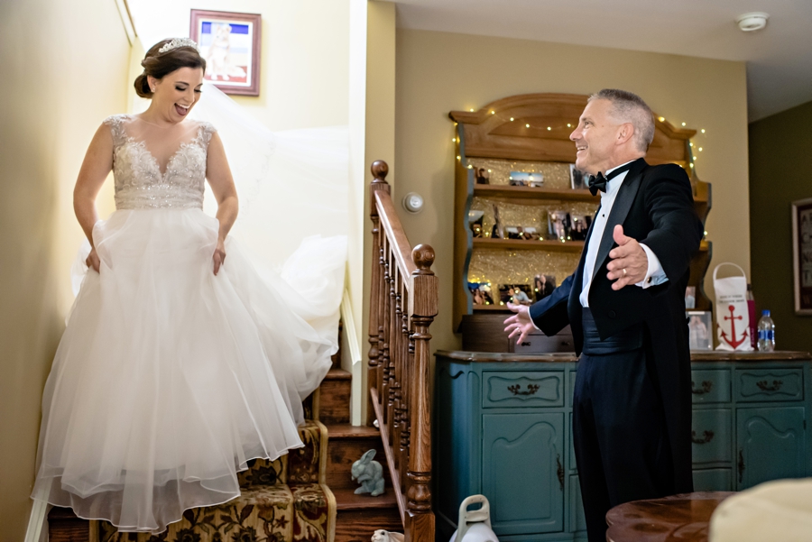 A father seeing his daughter for the first time on her wedding day.